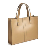Handmade leather shopper tote, light tan, side view with top handles and stitched seams