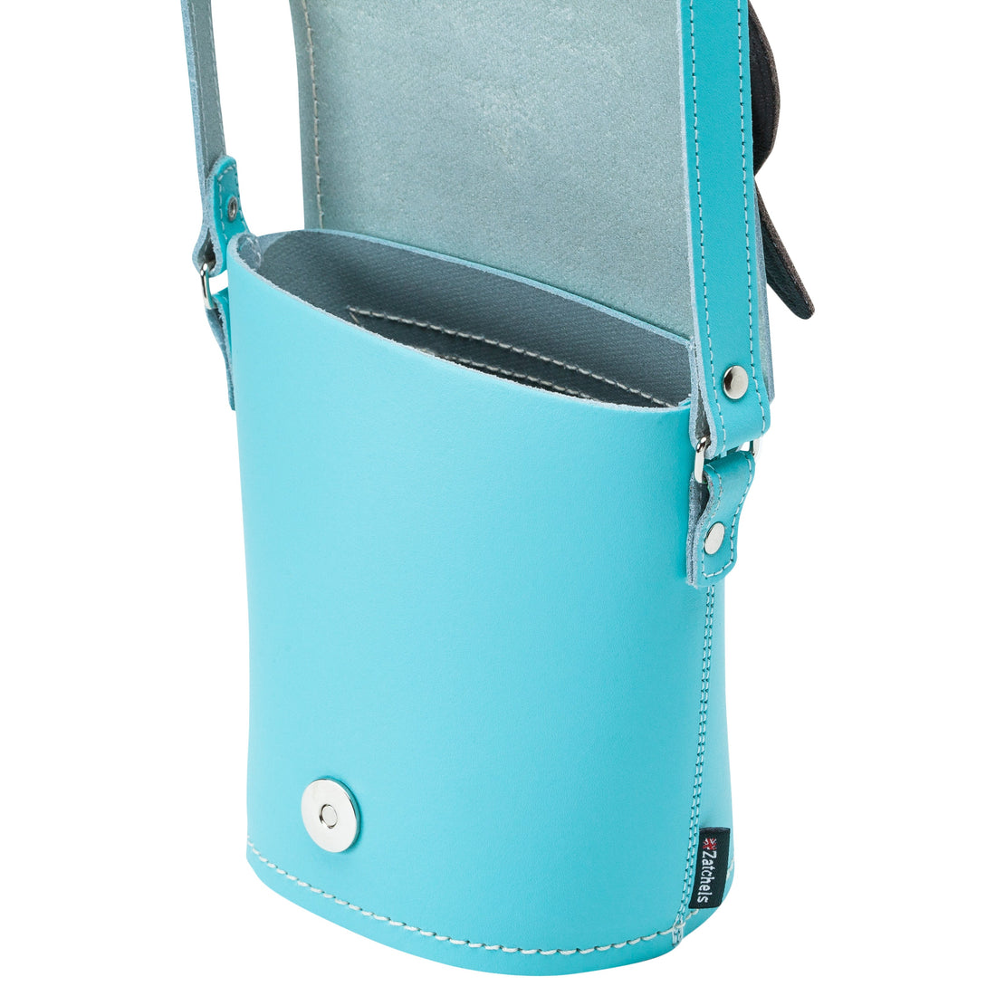 Light blue leather owl bag with snap button, side D-ring, and stitched top edge