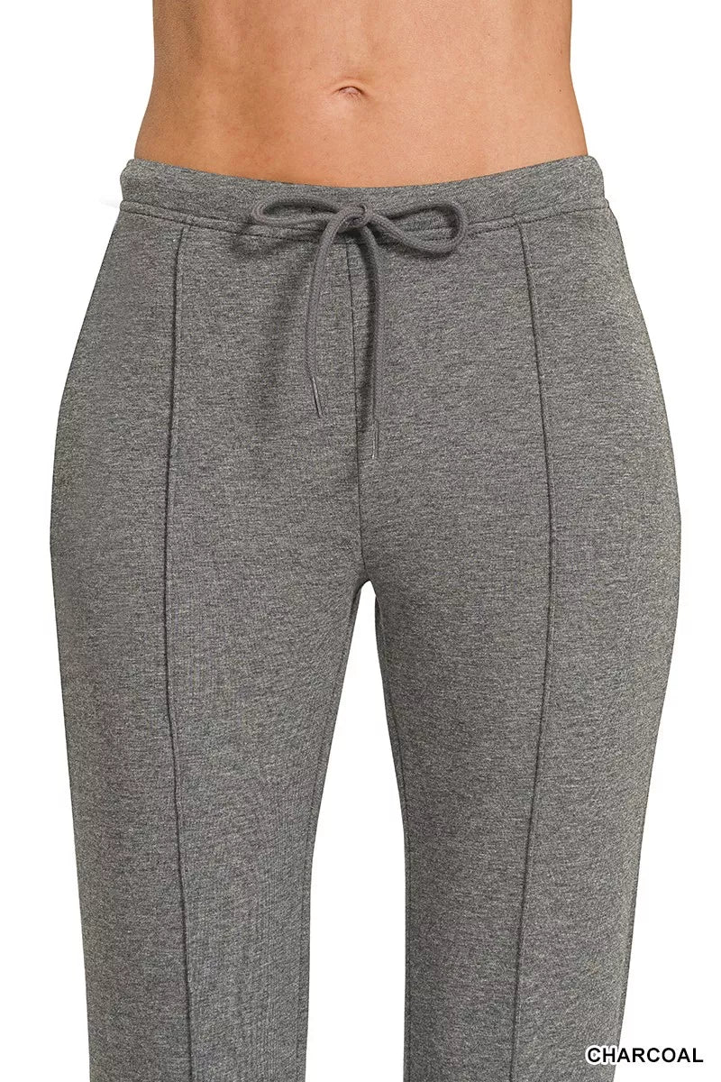 Charcoal drawstring waist pants with smooth front and straight-leg cut