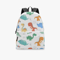 White canvas backpack with colorful dinosaur print and black top handle straps