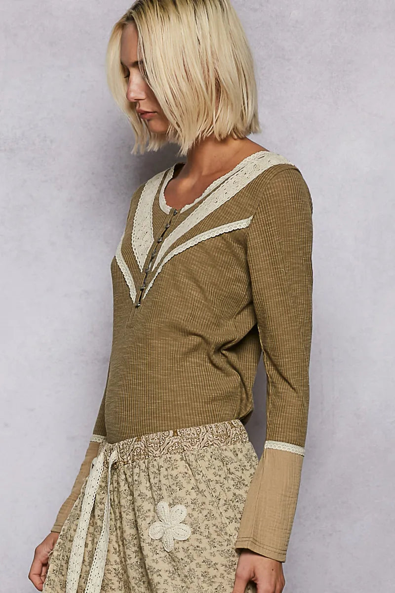 Olive ribbed knit top with white V trim, half-button placket, long sleeves