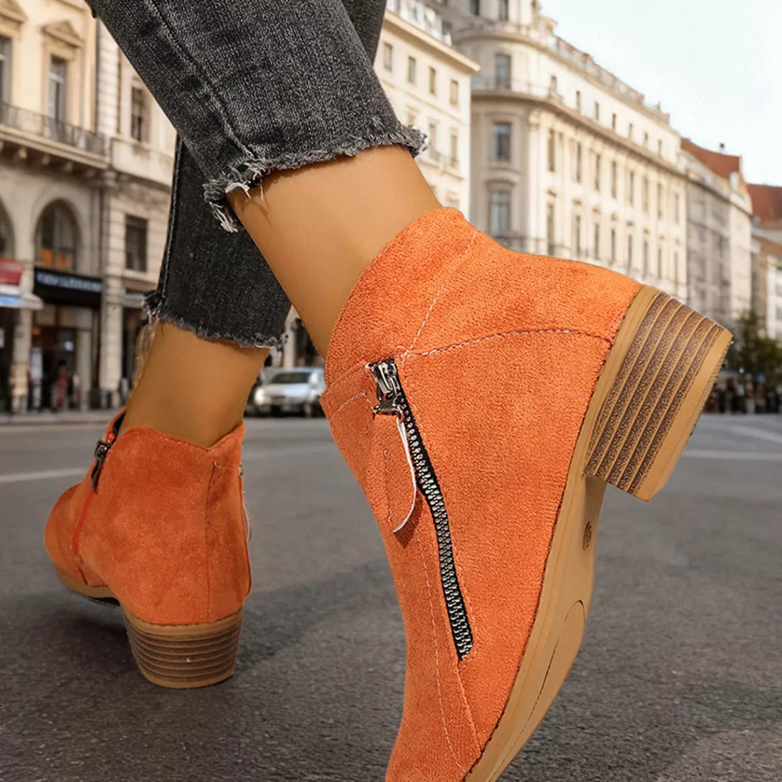 Orange suede point-toe block heel ankle boots with side zipper