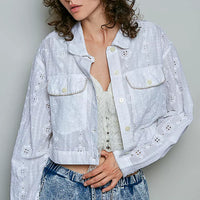 Off white eyelet cropped jacket with button-front and chest flap pockets, worn open