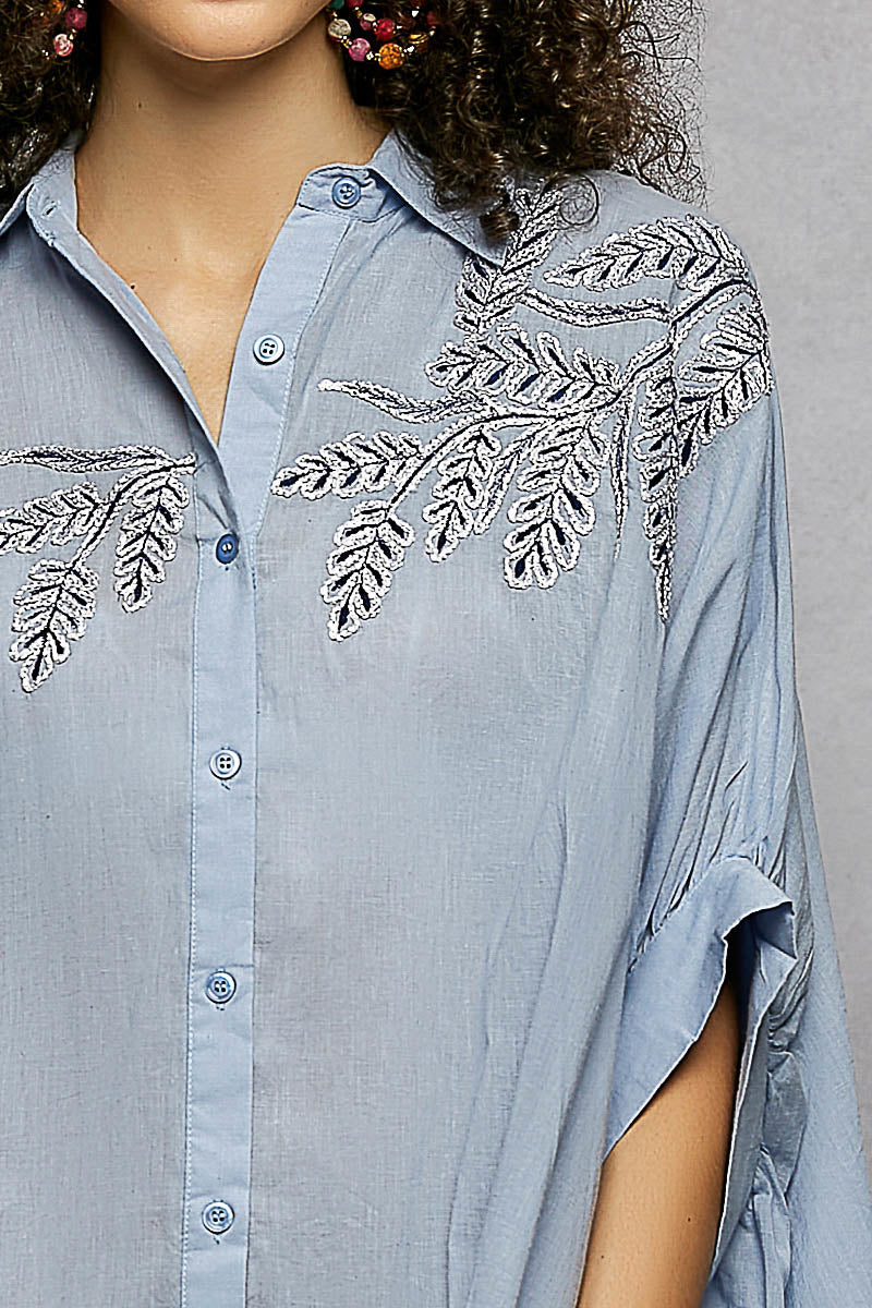 Sky blue button-down embroidered shirt front detail with floral leaf embroidery