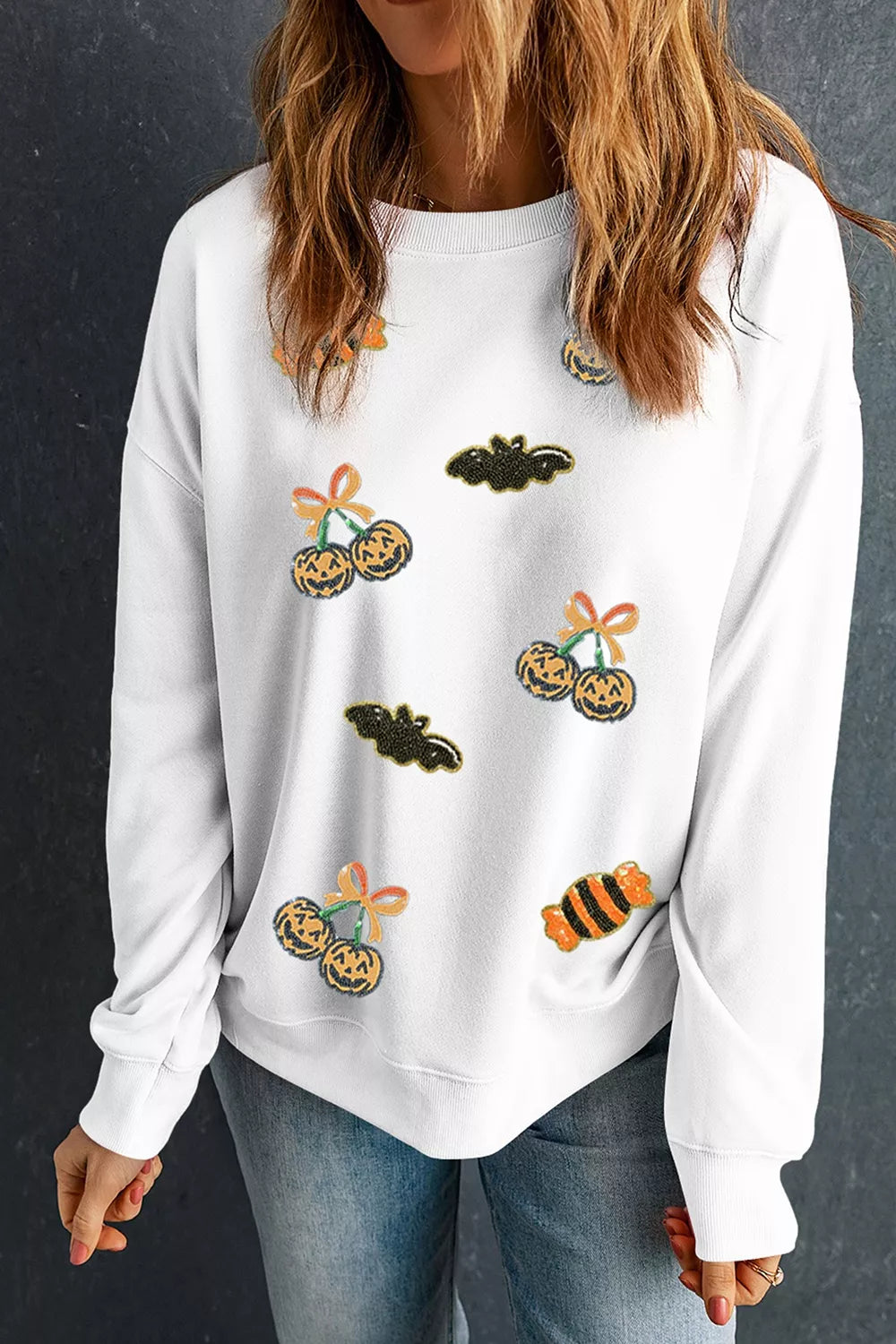 White crewneck pullover sweatshirt with sequin jack-o&