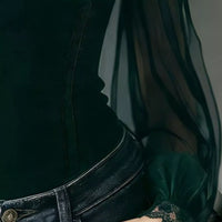 Dark green velvet blouse with lace trim and sheer sleeves, fitted bodice detail