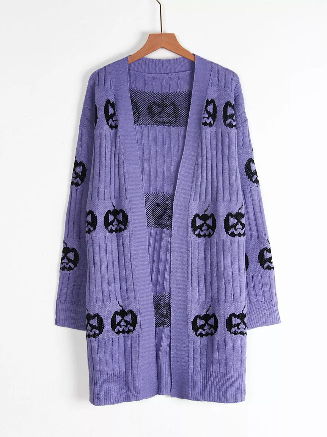 Purple long open-front knit cardigan with black jack-o-lantern print, on hanger