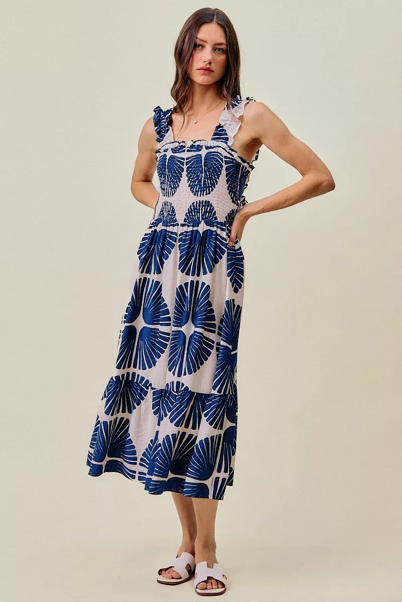 Navy abstract print tiered midi dress with smocked bodice and ruffle-trim straps