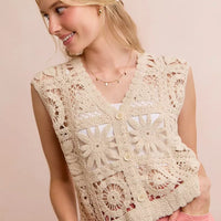 Natural crochet sleeveless vest top, V-neck, starburst granny-square motifs front view