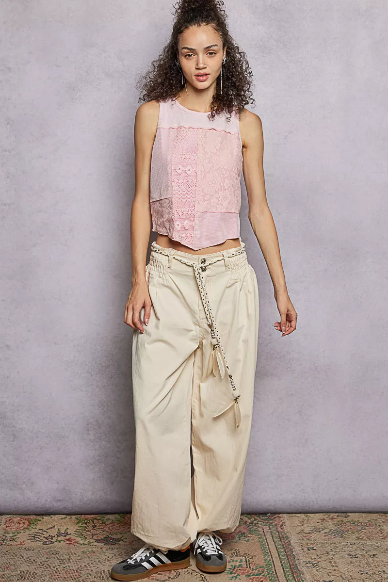 Pink sleeveless cropped tank with lace front and ribbed round neck