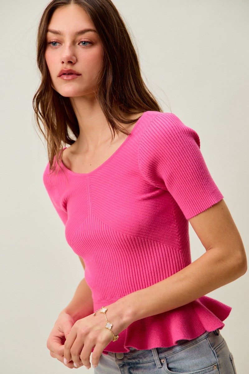 Hot pink ribbed knit short-sleeve sweater top with peplum ruffle