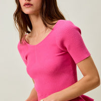 Hot pink ribbed knit short-sleeve sweater top with peplum ruffle
