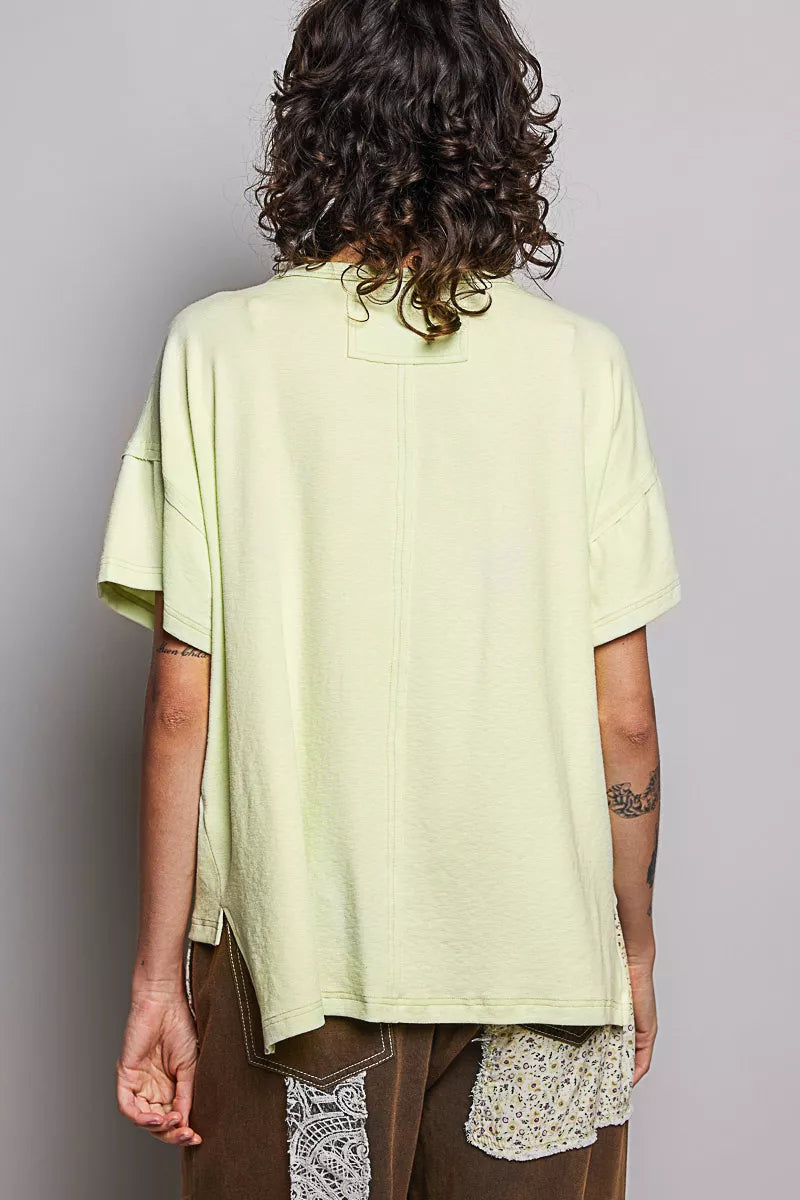 Mint green round-neck short-sleeve T-shirt, back view; high-low hem longer at back