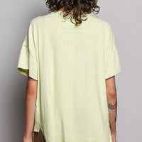 Mint green round-neck short-sleeve T-shirt, back view; high-low hem longer at back