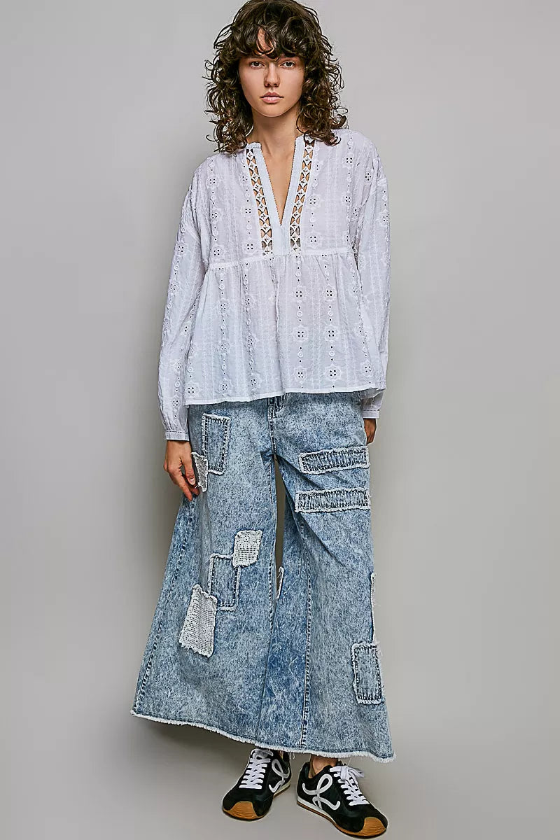 Off-white cotton eyelet blouse with V-neck and long sleeves, relaxed fit