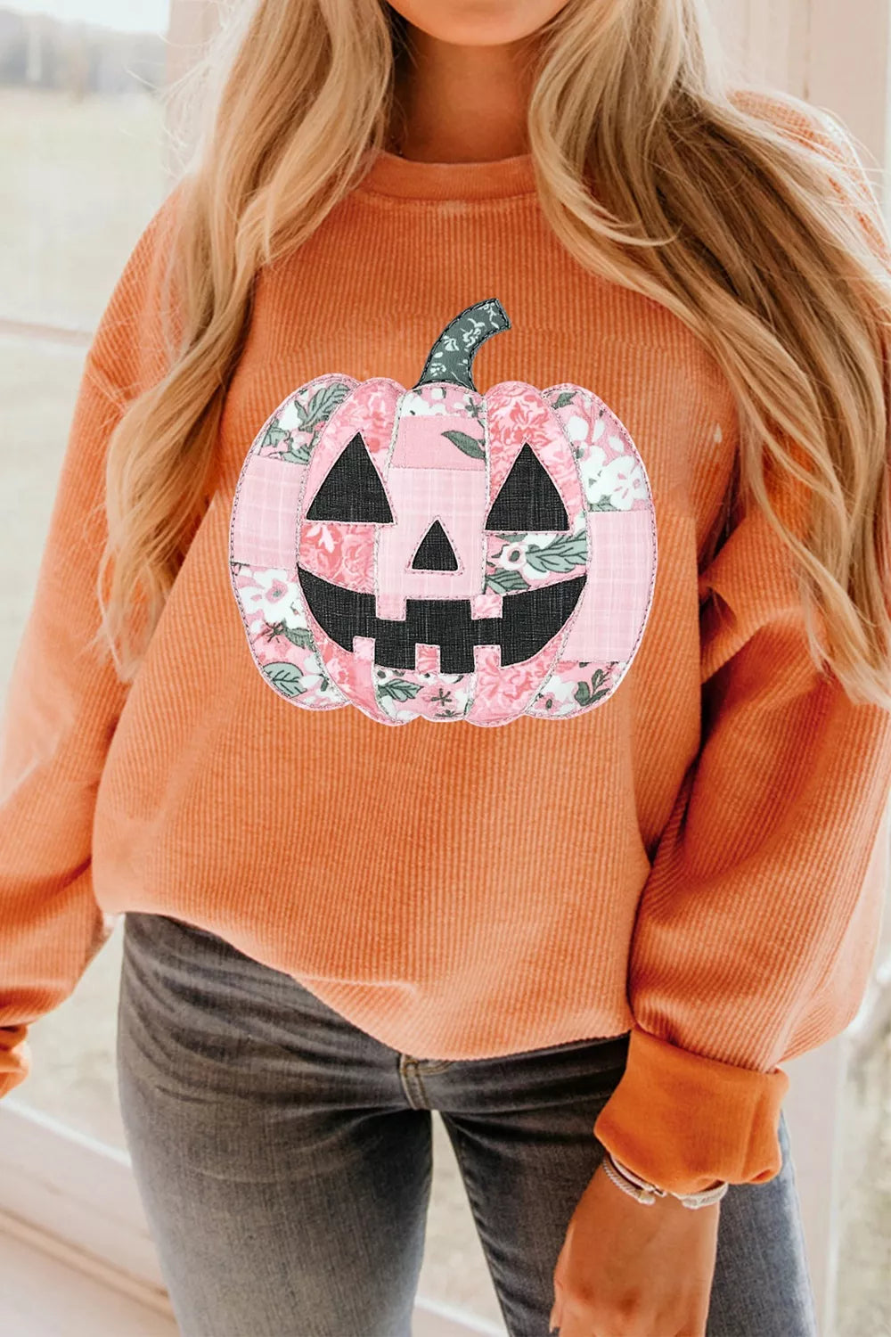 Orange sherbet tunic sweatshirt with round neck and large patchwork jack-o&