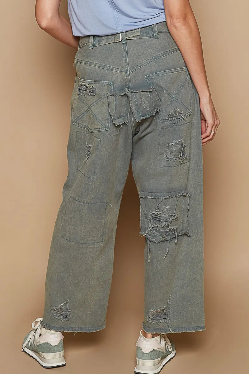 Distressed wide-leg denim pants, patchwork panels, raw frayed hem