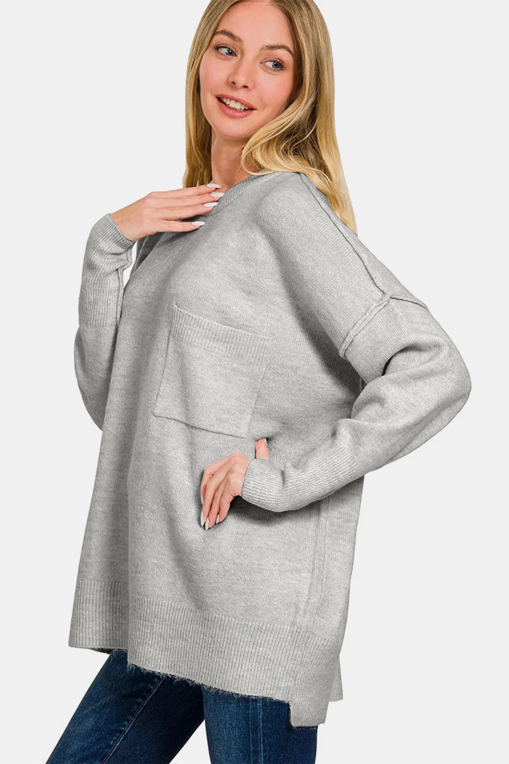 Grey drop-shoulder sweater with ribbed cuffs and high-low hem