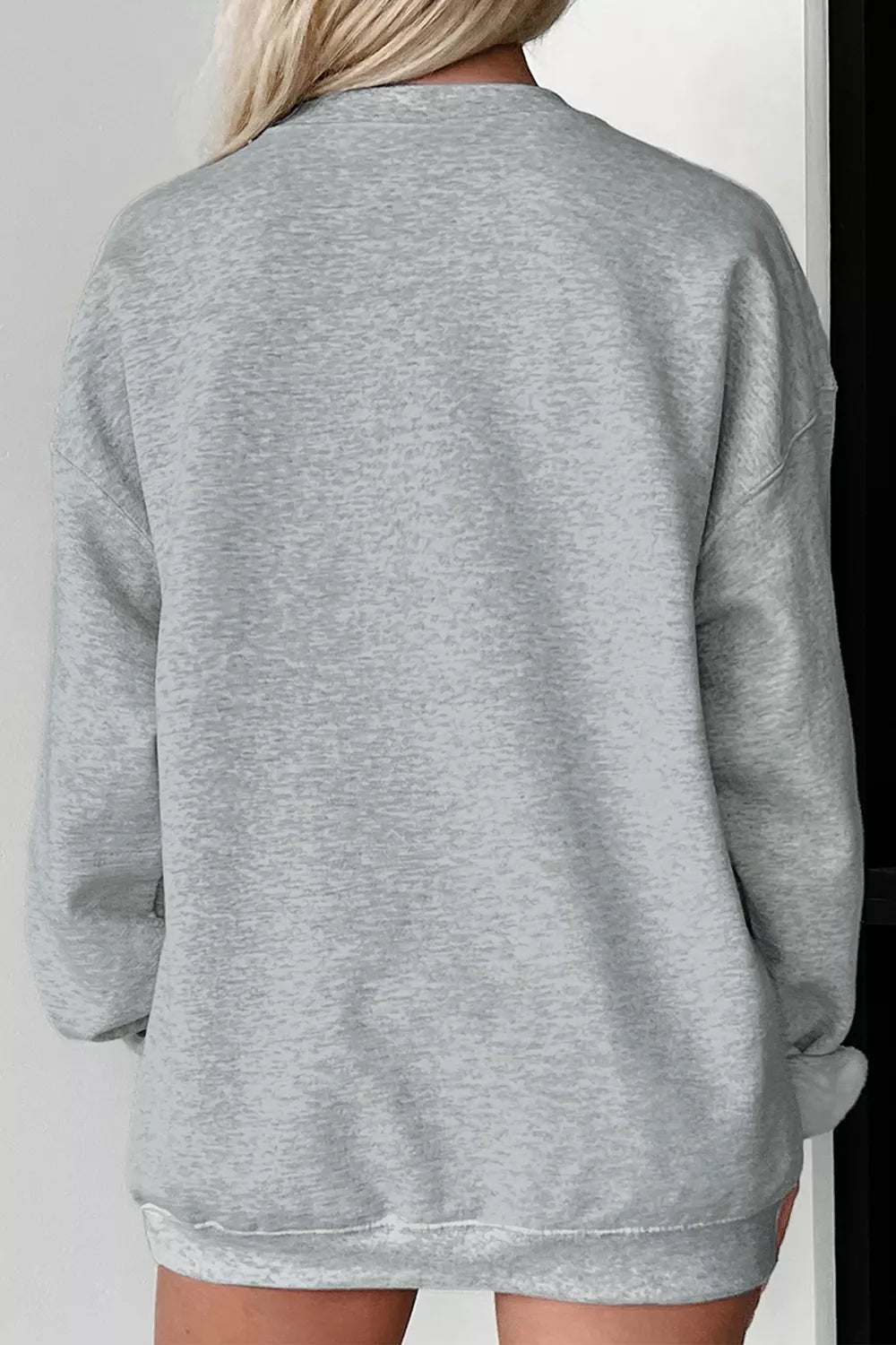 Gray oversized pullover sweatshirt back view with relaxed fit and ribbed cuffs