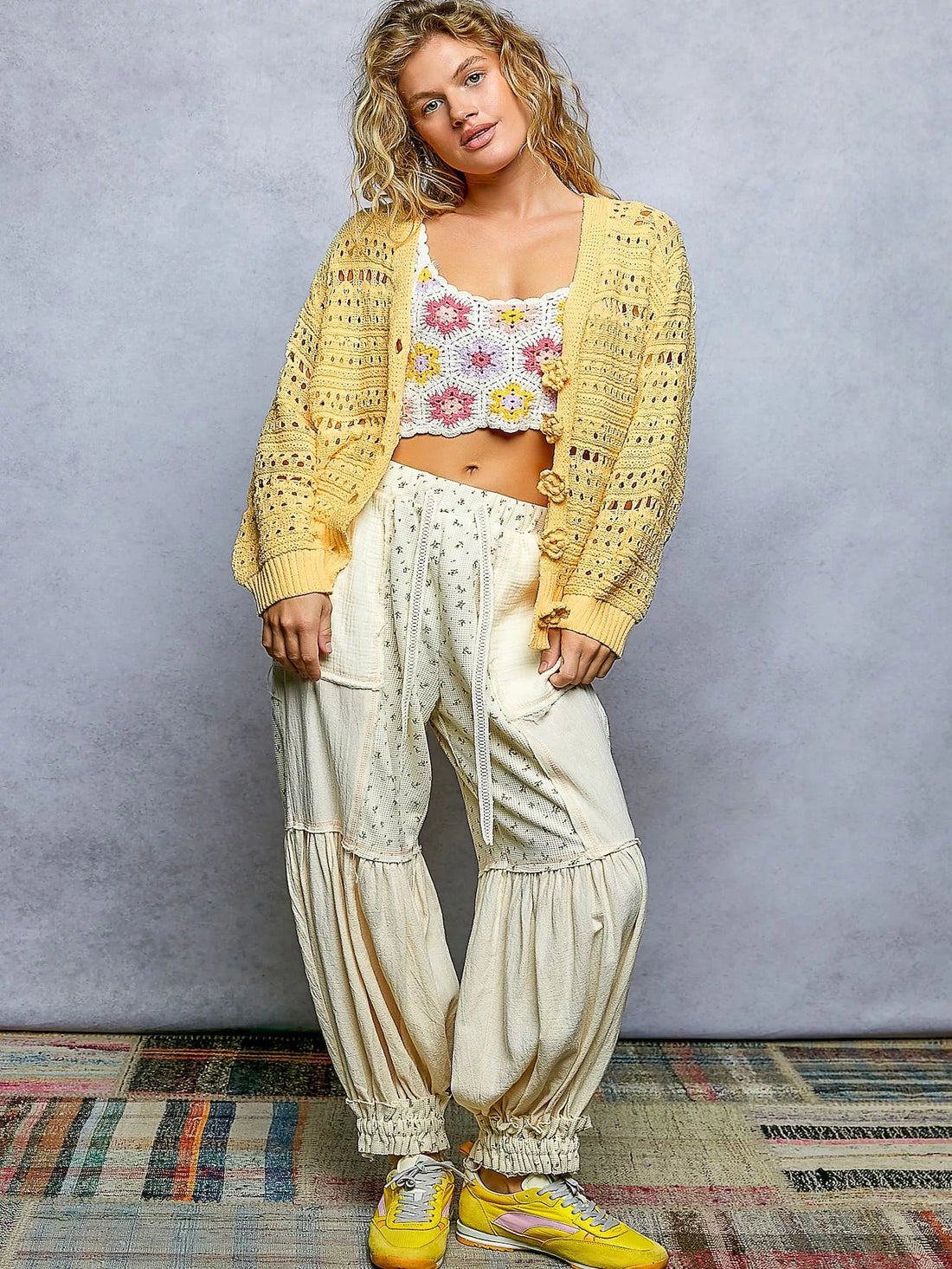 Yellow open-knit button cardigan, relaxed fit with long sleeves and ribbed cuffs