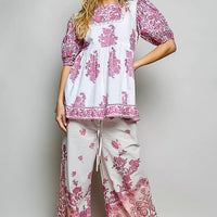 Ivory and pink floral hand-block print blouse with puff sleeves and tassel trim