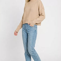 Light mocha oversized cropped sweater with ribbed hem and relaxed long sleeves