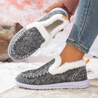 Grey faux fur lined round toe slip-on shoes with white fur collar and stitched edge