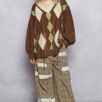 Brown mohair argyle V-neck sweater with long sleeves, diamond pattern, and contrast stitch lines