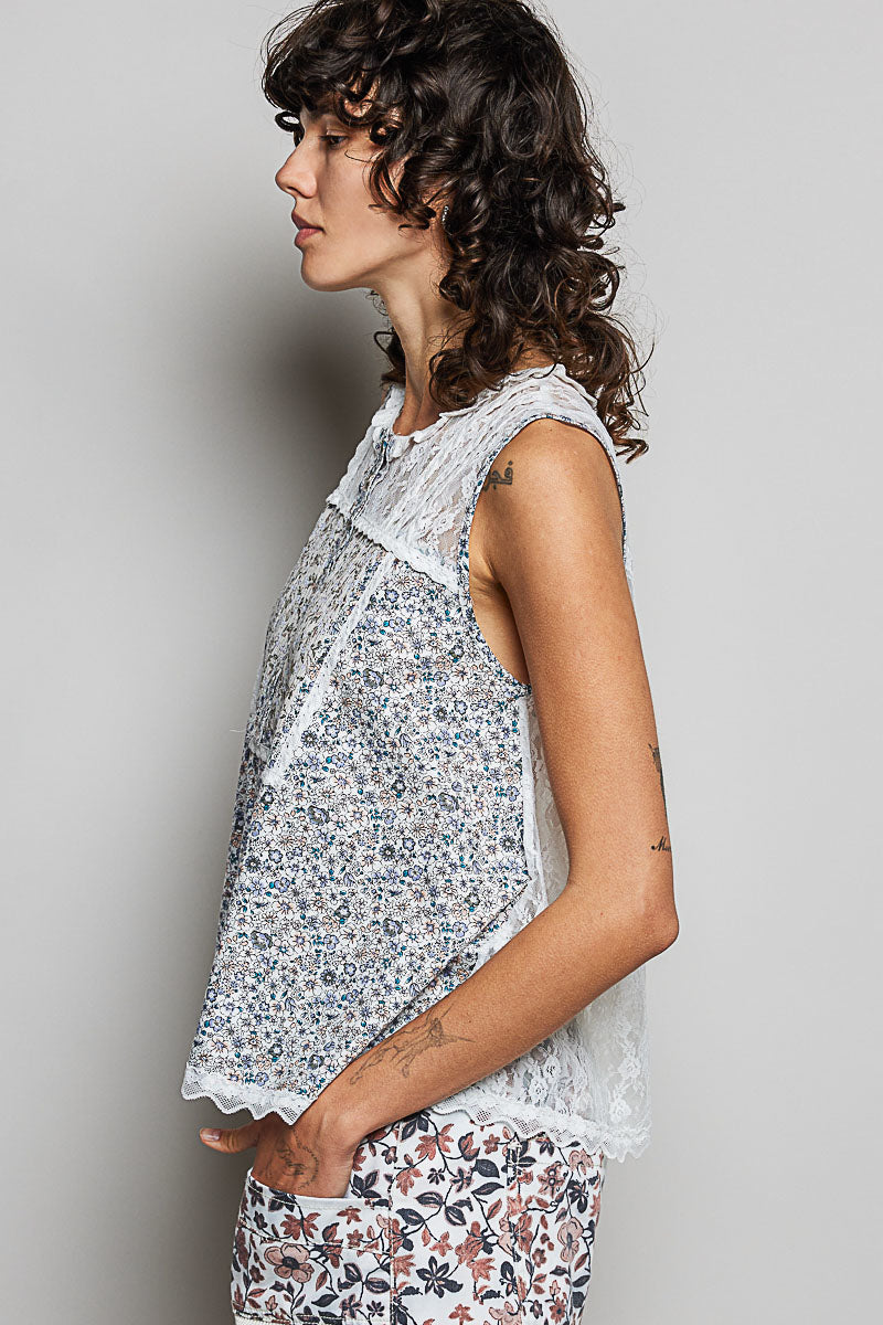 Off-white sleeveless lace back round-neck top with blue floral print panels