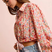 Floral print crop shirt with puff sleeves, gathered yoke, and tied hem