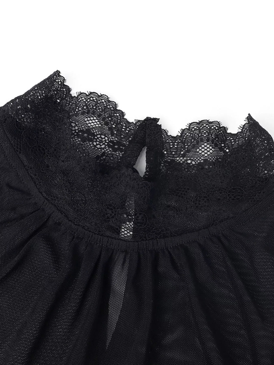Black lace neckline with sheer yoke on a velvet blouse