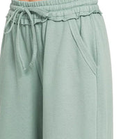 Ash blue wide-leg sweatpants with elastic waistband and adjustable drawstring