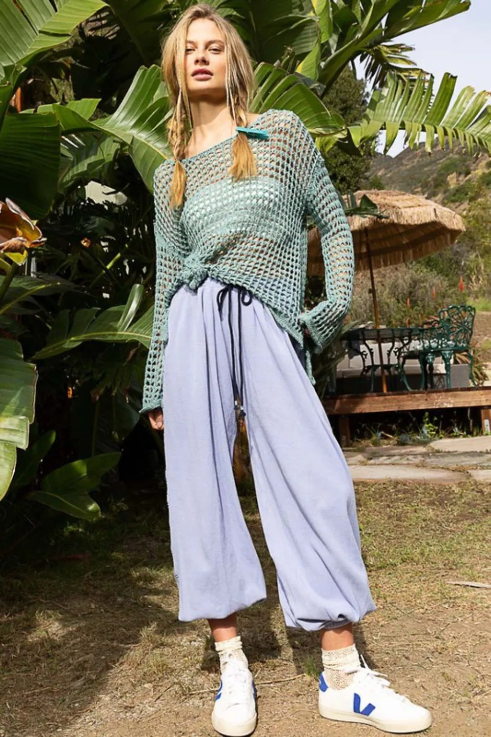 Dusky teal openwork knit cover-up with long sleeves, drawstring waist, side slit hem