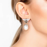 Bee drop earrings with pear-shaped pearl drops, hanging from crystal bee charm