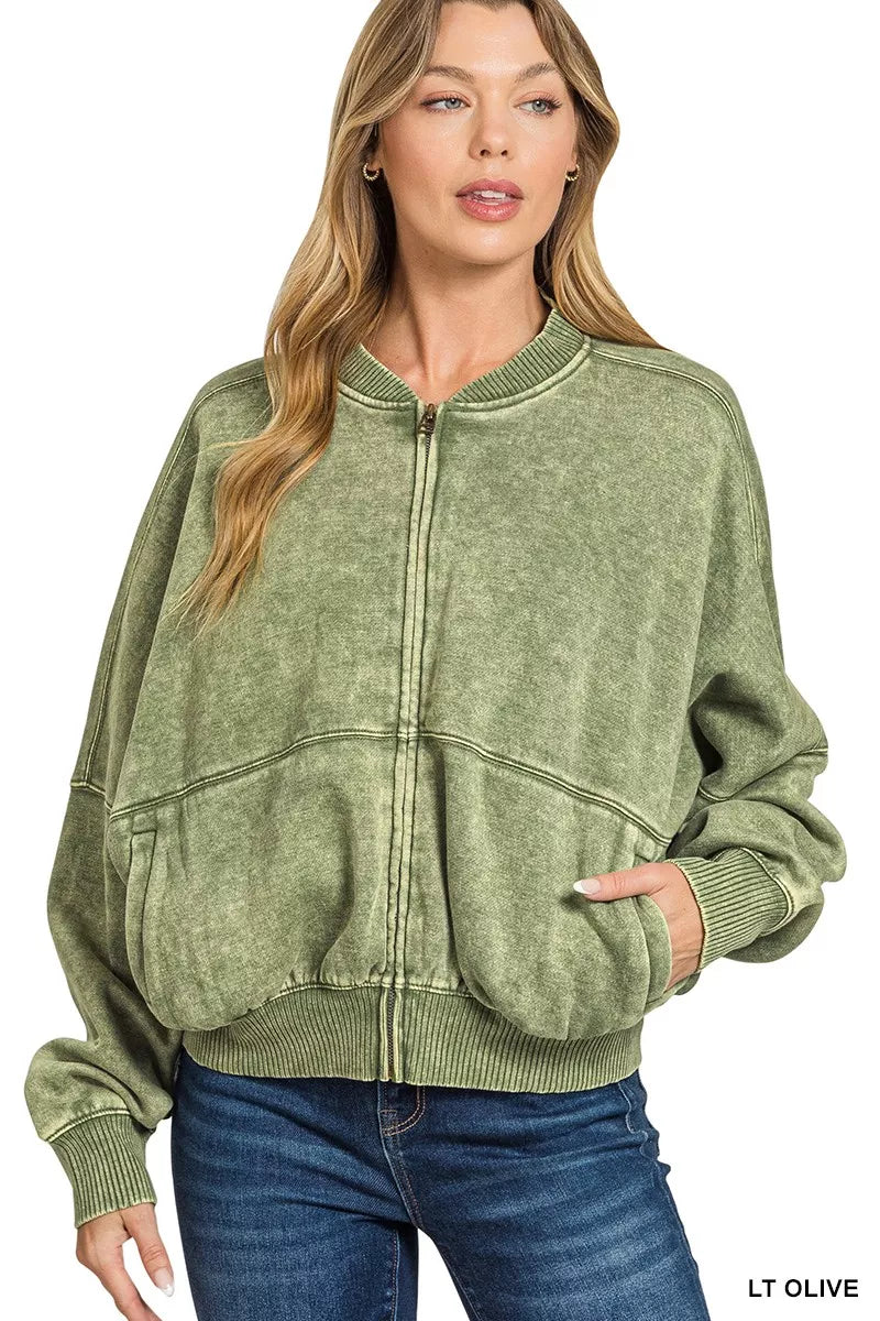 Olive acid-washed fleece zip jacket with ribbed collar, cuffs, hem, and front pockets