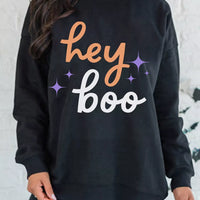 Black Halloween sweatshirt with 'hey boo' front graphic, crew neck, long sleeves