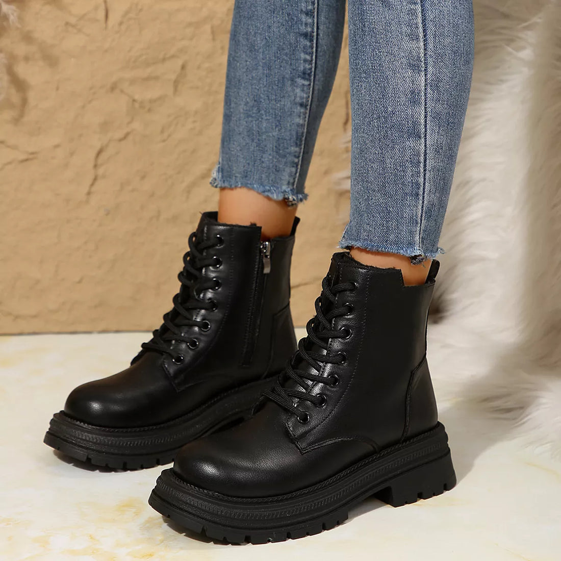 Black lace-up platform round-toe boots with side zipper and chunky outsole