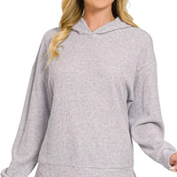 Grey pullover hoodie with hood, front pouch pocket, ribbed cuffs and hem