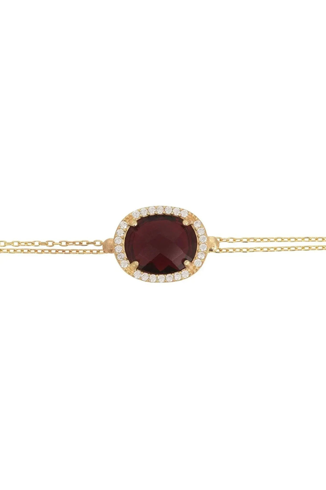 Gold bracelet with oval garnet gemstone and crystal halo
