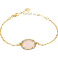 Gold-tone oval gemstone bracelet with pink cabochon and crystal halo