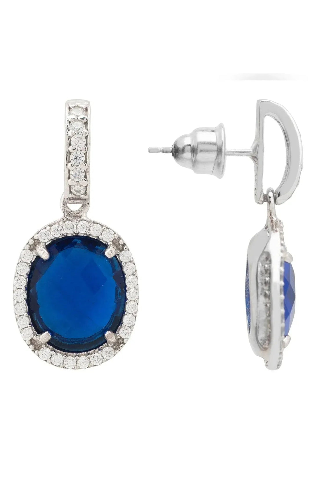 Silver drop earrings with blue oval gemstone and crystal halo, shown with back