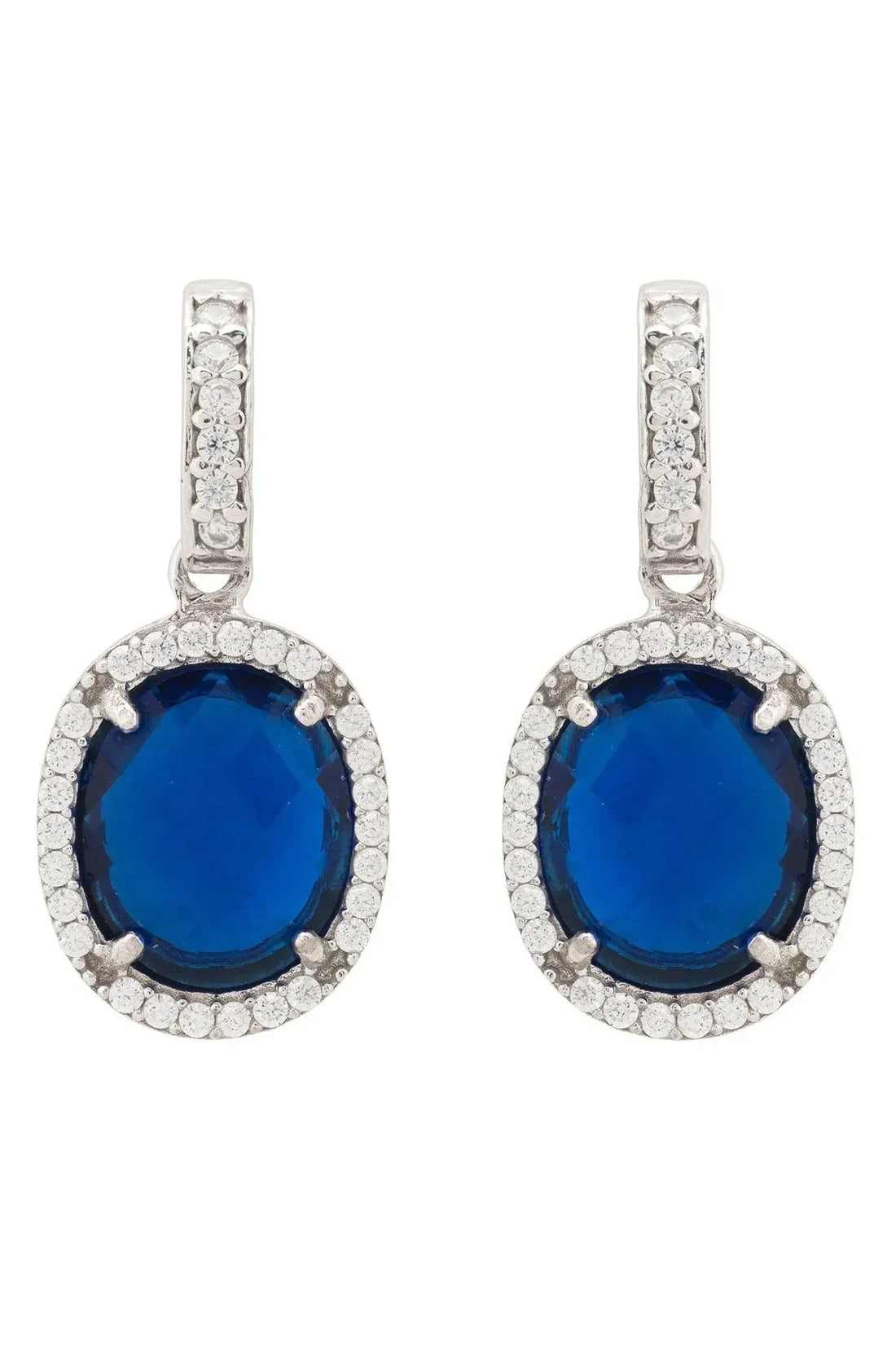 Silver oval drop earrings with blue round gemstone and white crystal halo