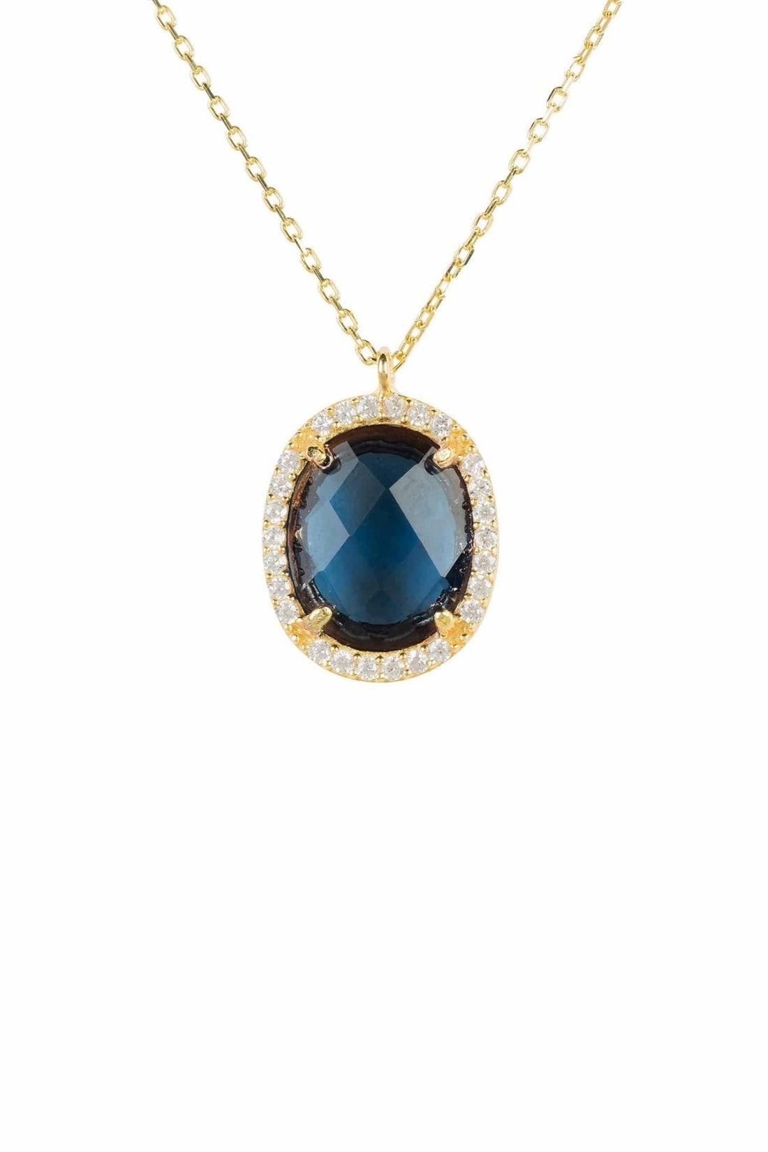 Gold oval gemstone pendant necklace with blue oval center and halo of clear stones