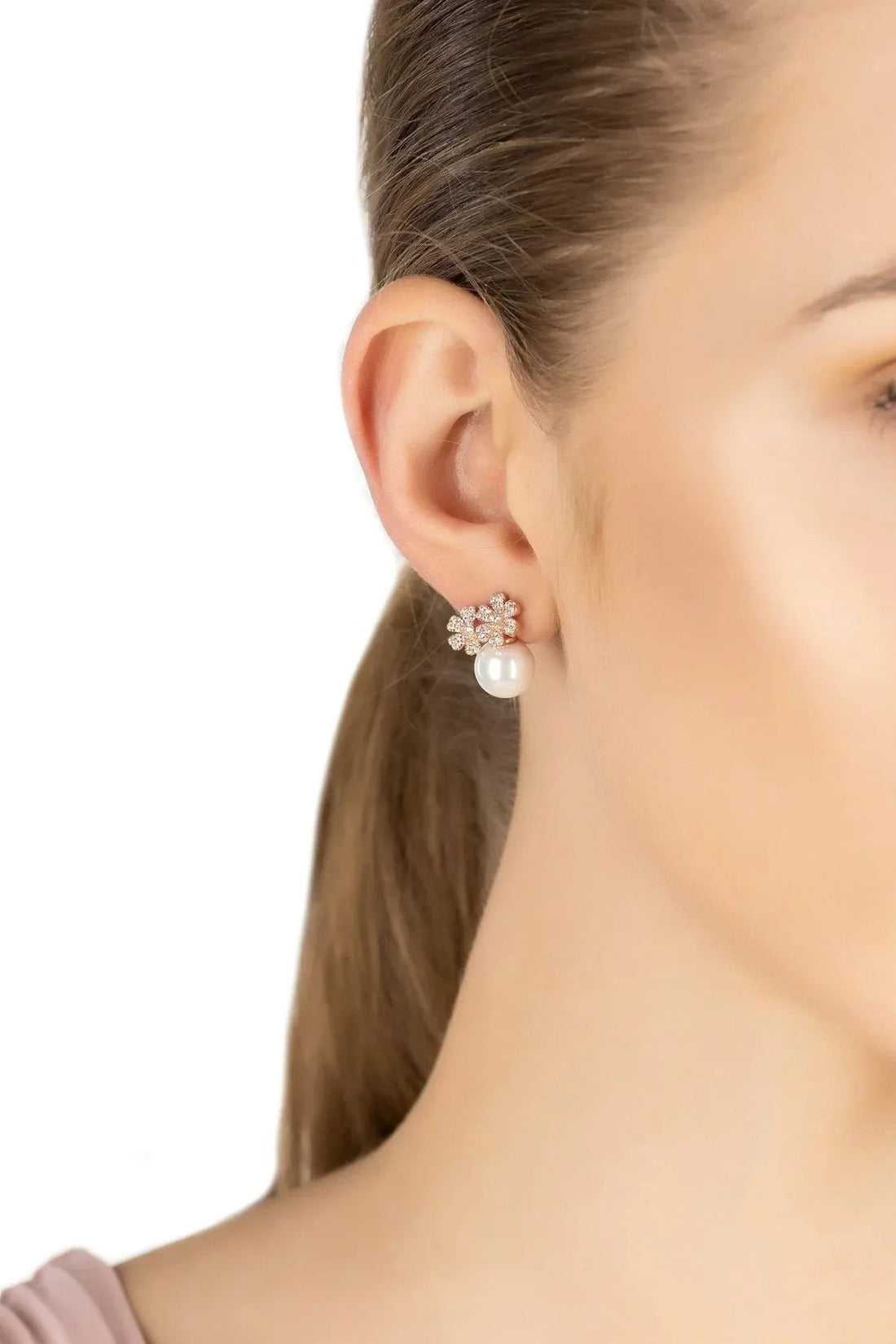 Rosegold floral stud earrings with pearl drop and clear stones
