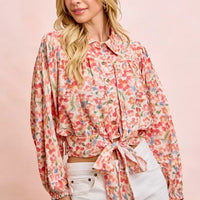 Floral print crop shirt with button front, ruffled yoke, and tied front hem