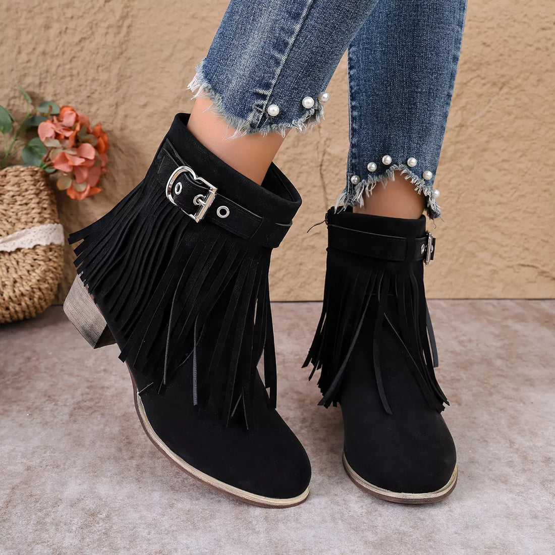 Black suede fringe ankle boots with buckle strap and block heel