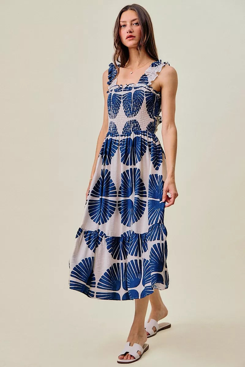 Smocked bodice tiered midi dress with navy abstract print, sleeveless, lined