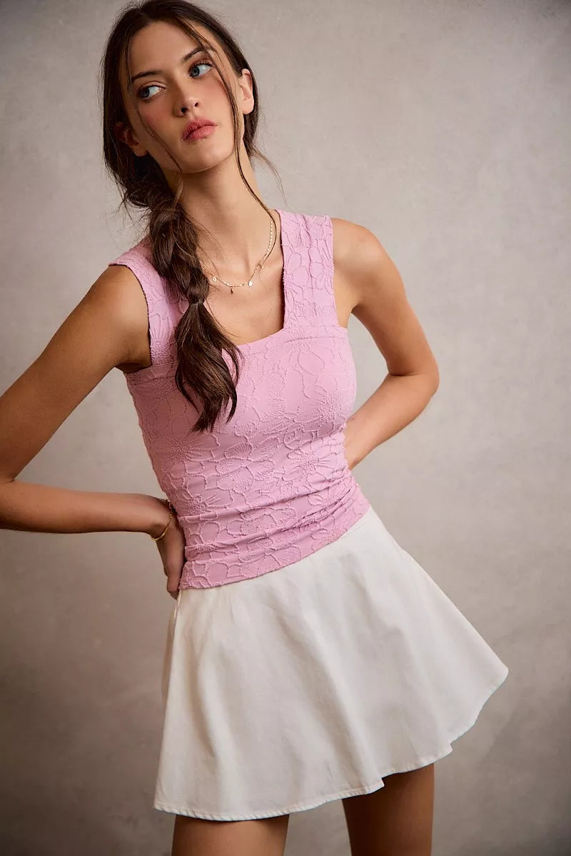 White bubble skort with smocked back waistband and flared mini skirt hem