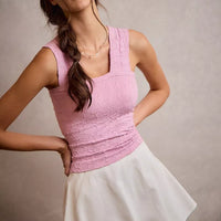 White bubble skort with smocked back waistband and flared mini skirt hem