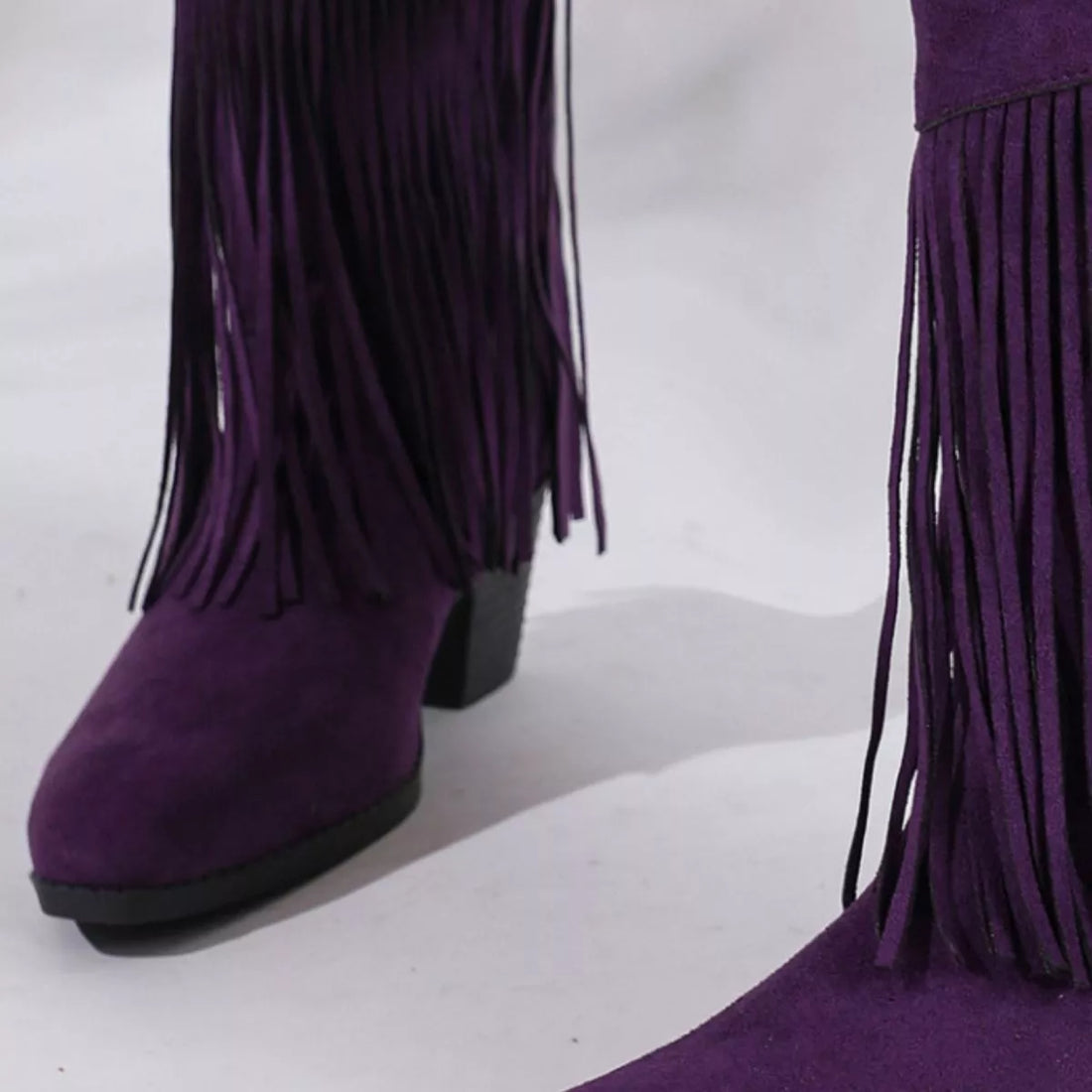 Purple fringe round-toe block-heel boots, side view with tassel fringe and heel